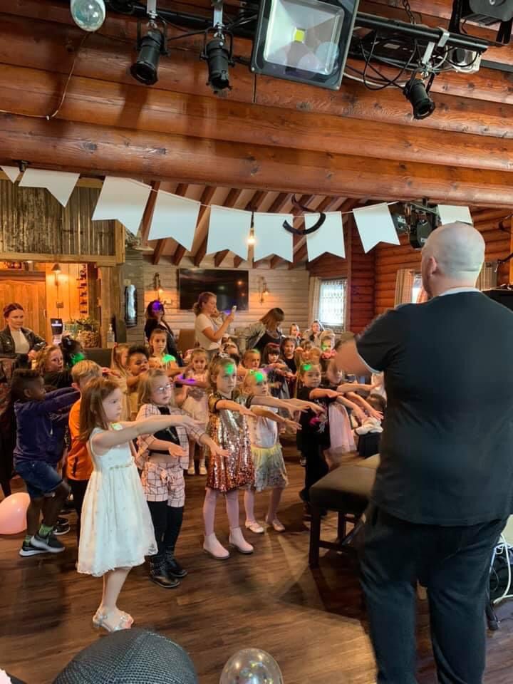 Kids DJ John hosting children's party